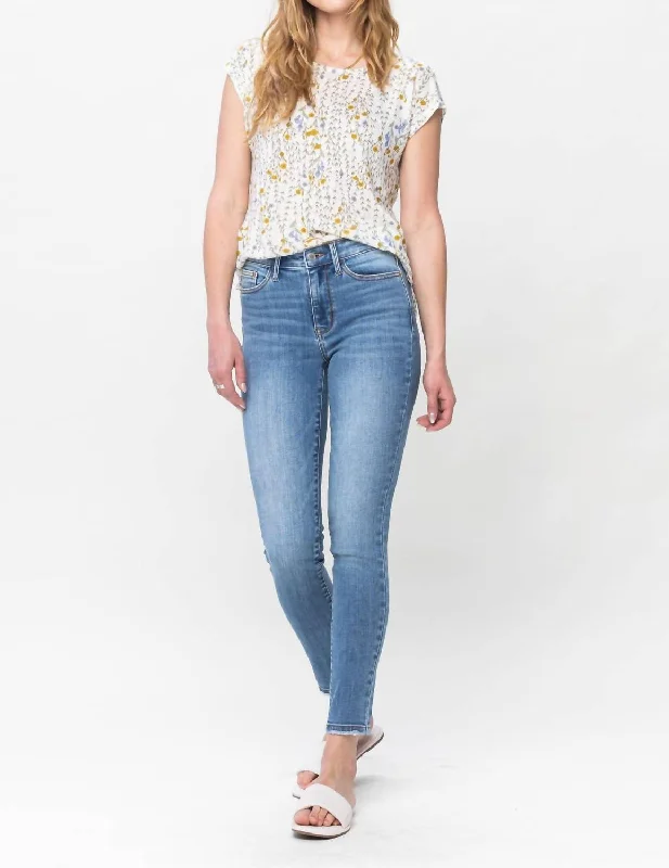 mid-rise-skinny-jeans-in-medium-wash