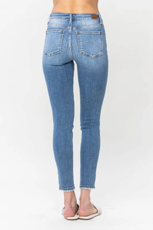 mid-rise-skinny-jeans-in-medium-wash